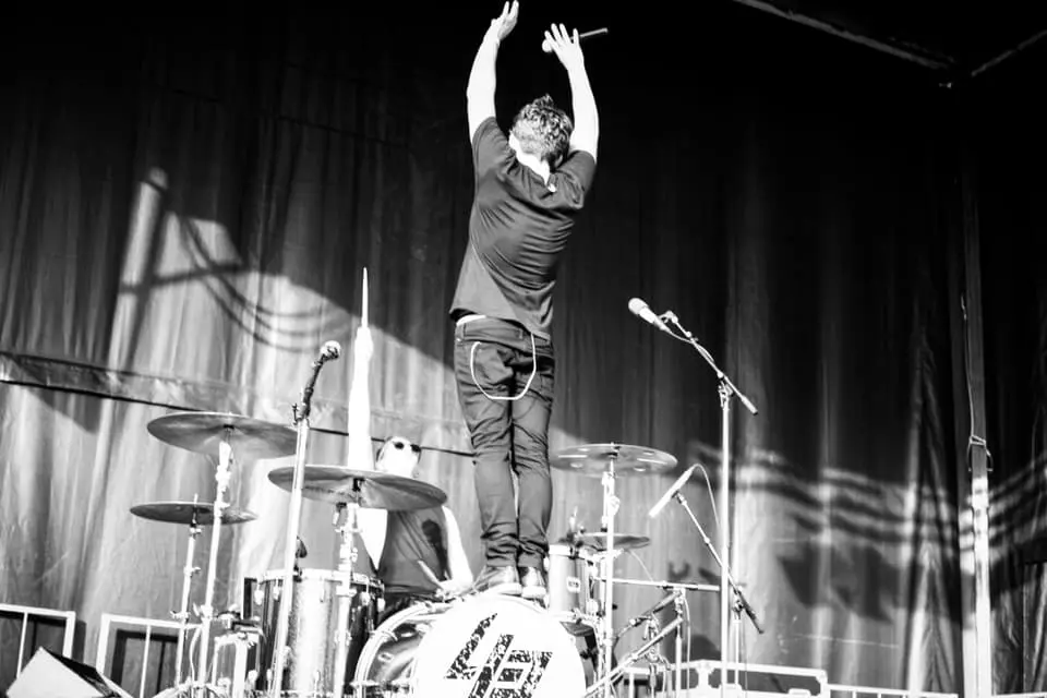 4th Point performing at a festival (3)